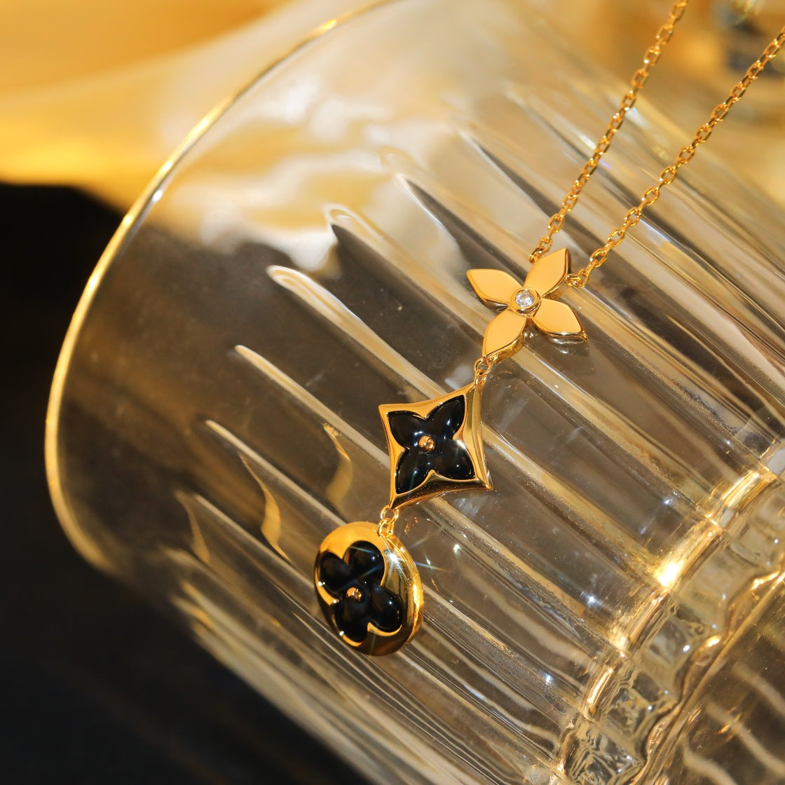 LOUIS VUITTON STAR AND SUN ONYX PINK GOLD NECKLACE