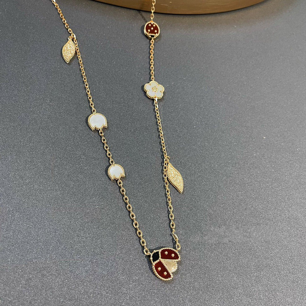 VCA LUCKY SPRING 15 MOTIFS GOLD NECKLACE